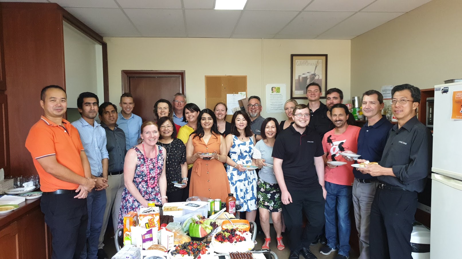 Part of the Precise culture is regular social get togethers for staff - pictured here: a group of staff enjoying a Harmony Day feast