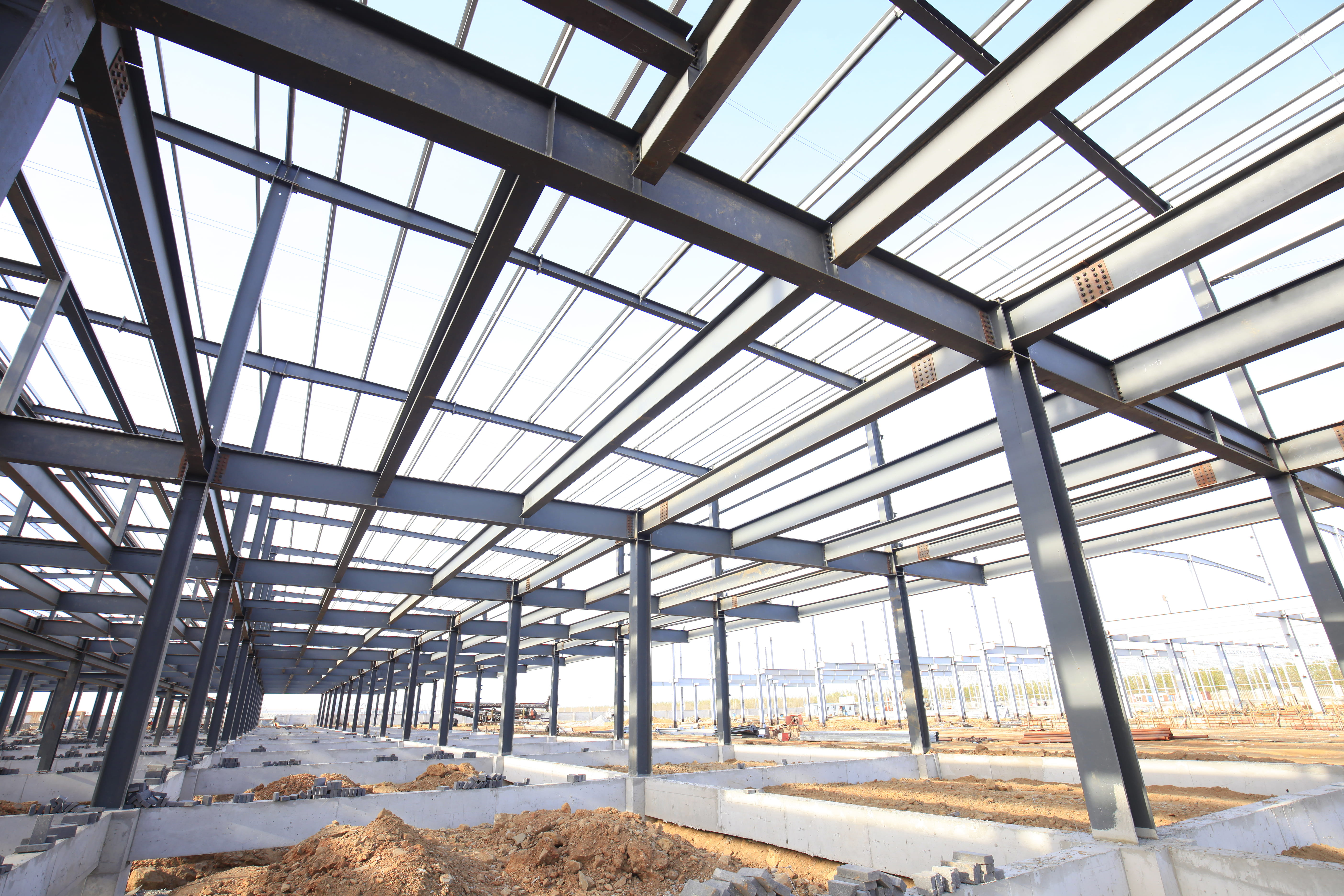 A steel frame structure for a large building requiring multiple contractors to work on project