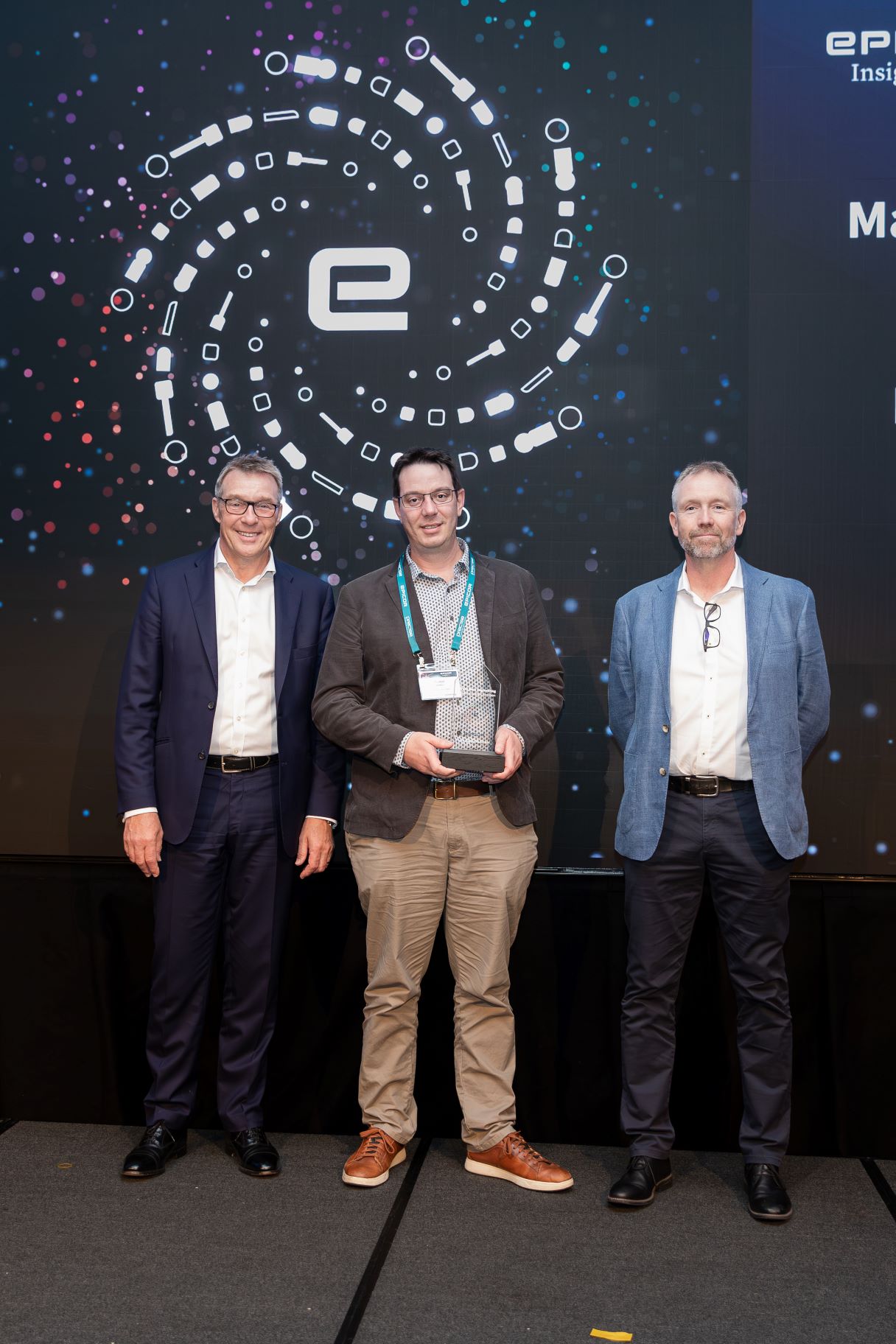 Epicor Manufacturing Champion Award recipient Simon Linaker from Bruce Rock Engineering with Epicor's Andy Coussins and Graham Evans